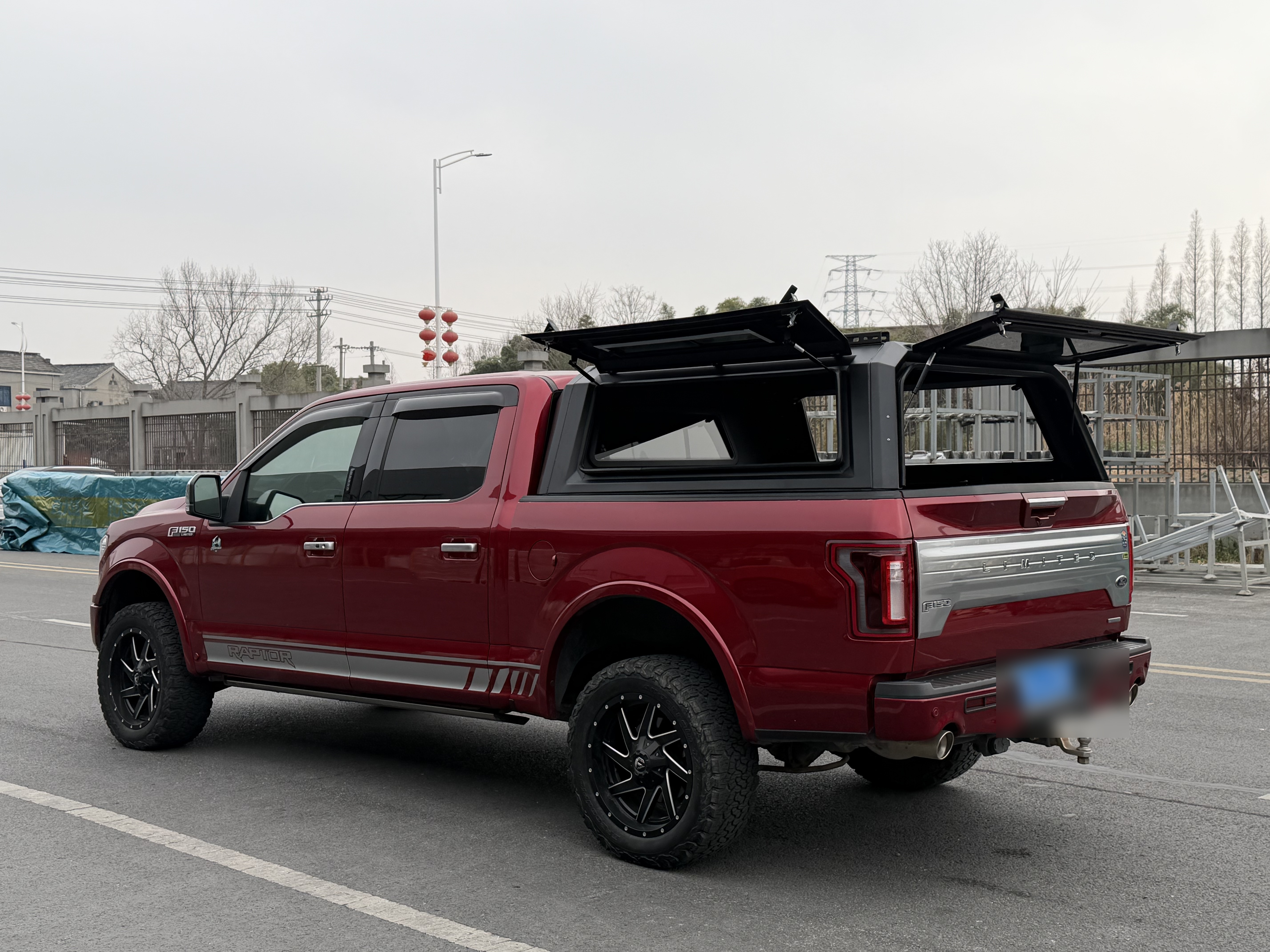 Ford F-150 canopy with gullwing doors open