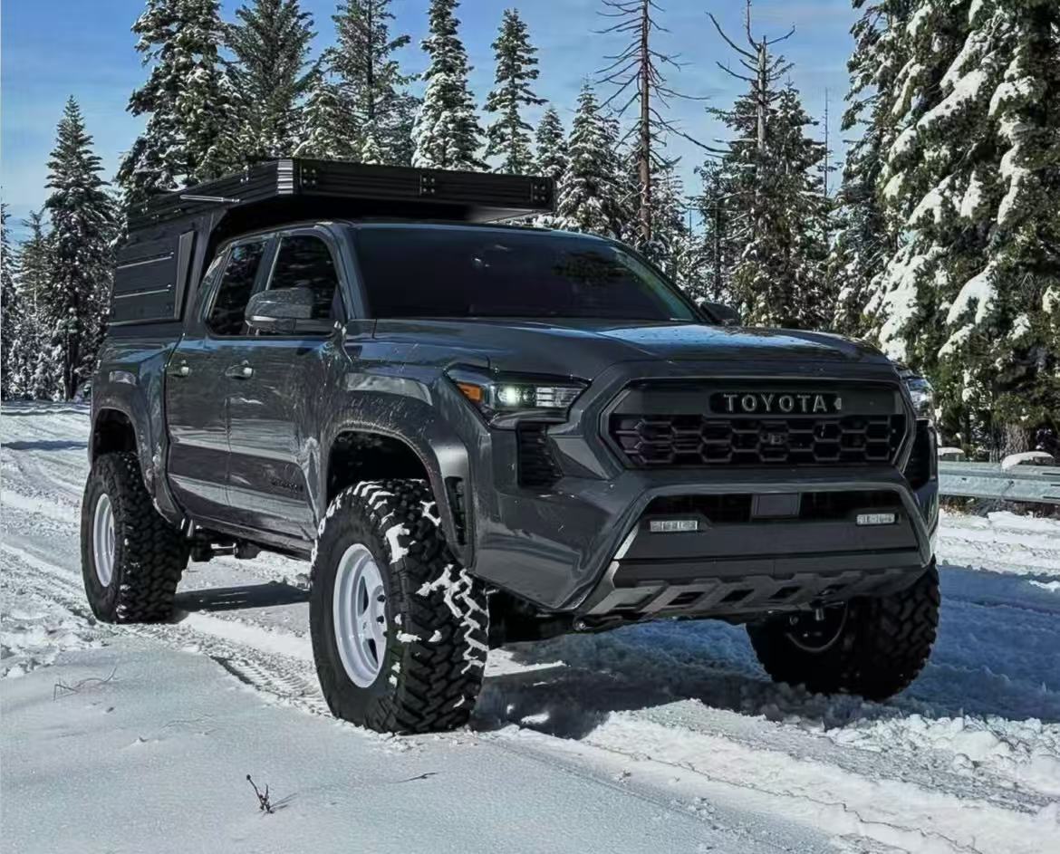 Toyota Tacoma canopy in snowy overland conditions