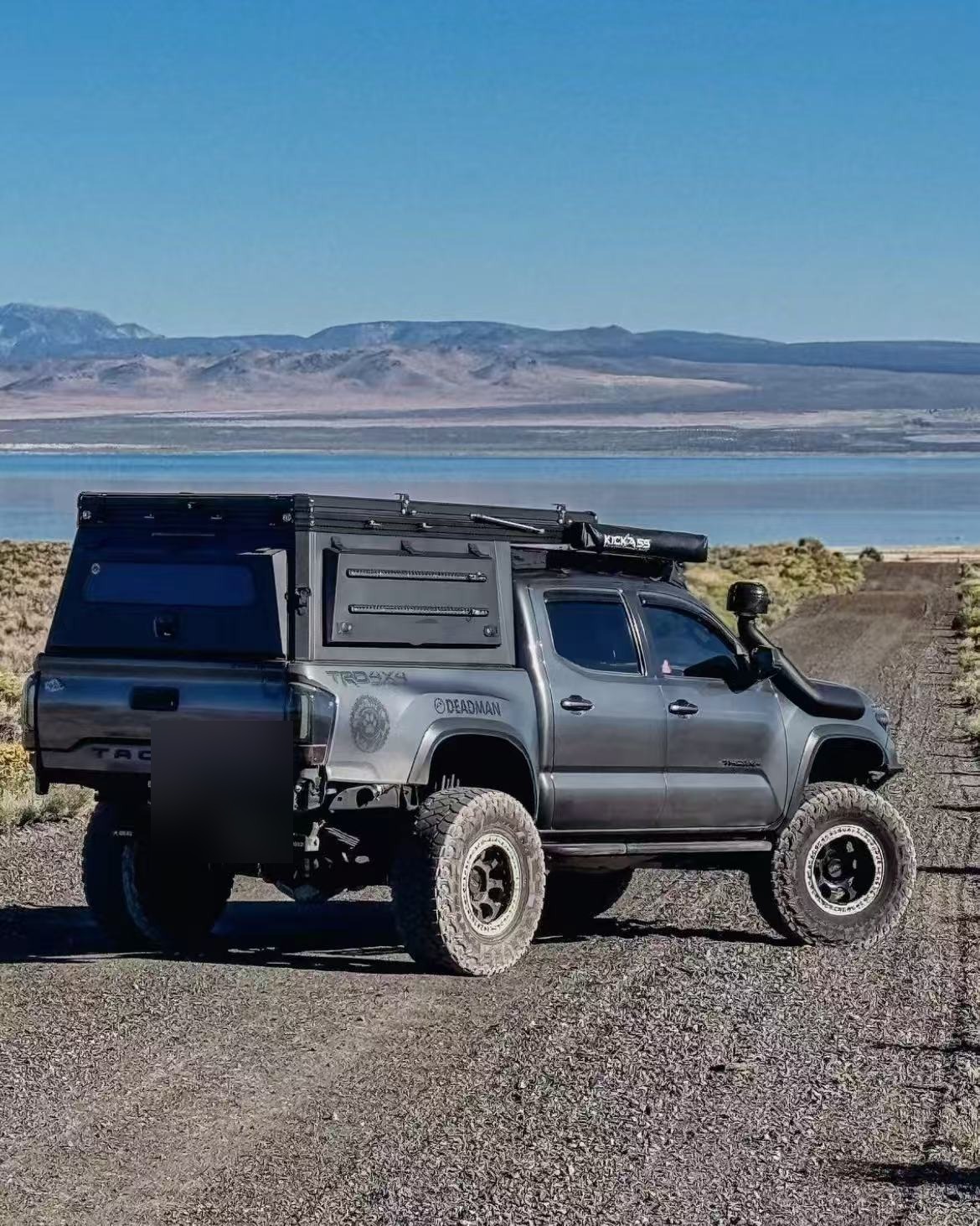 Toyota Tacoma overland canopy in desert terrain